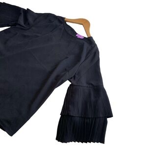 Black top with pleated bell sleeves and zip up back , Large, NWT
